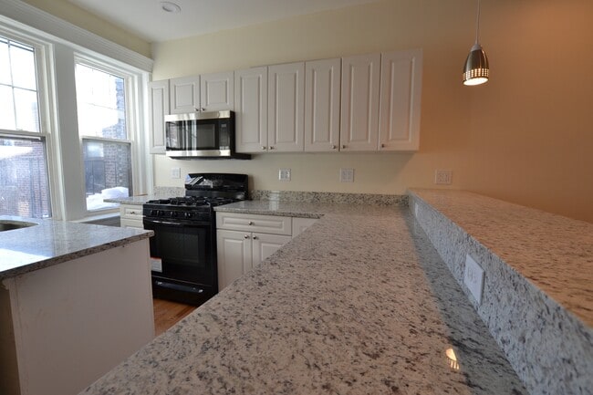 Building Photo - 1880 Commonwealth Ave Unit 14