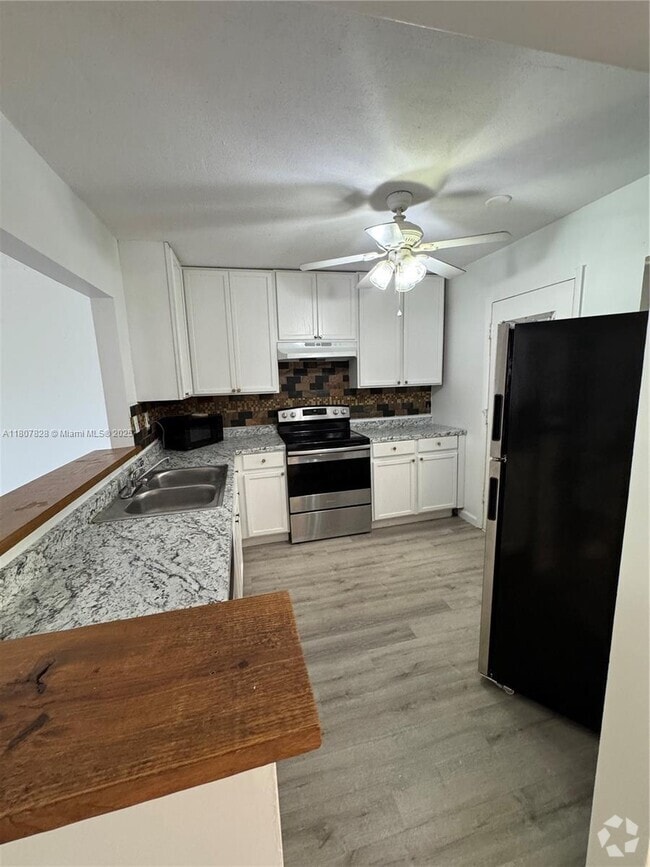 Building Photo - 403 NW 68th Ave Unit 114 Rental