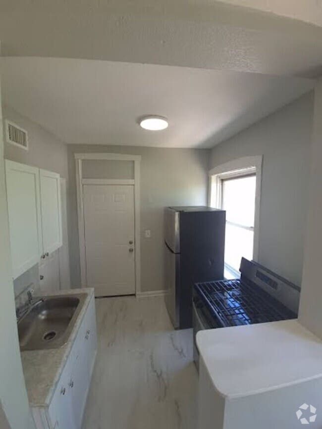 Building Photo - 1430 S Kenneth Ave Unit 1432-3E Rental