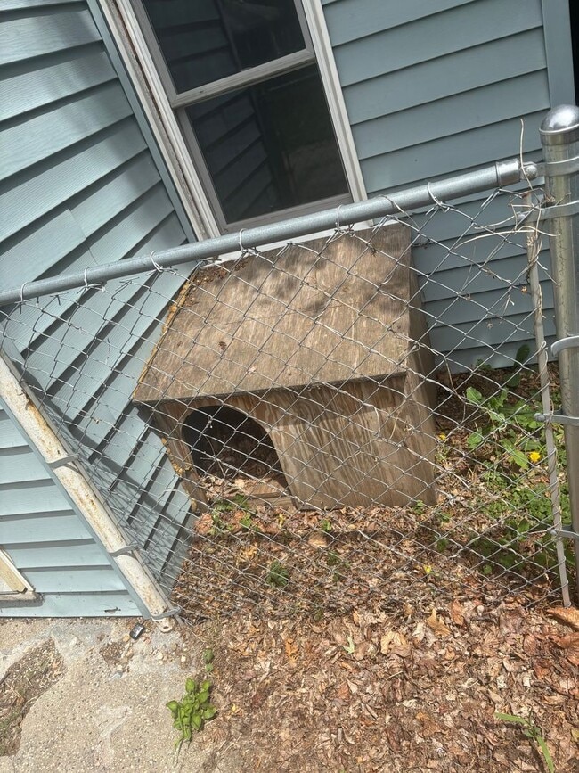 Photo - Perfect Home for You and Your Pup! Dog House Included + Fenced Yard