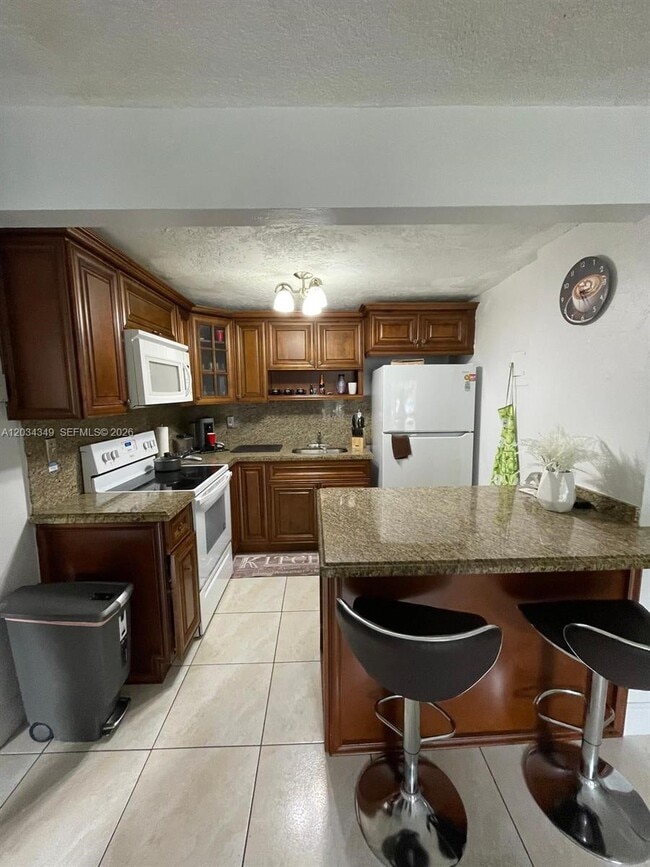 Photo - 4275 NW S Tamiami Canal Dr Unit 2-111