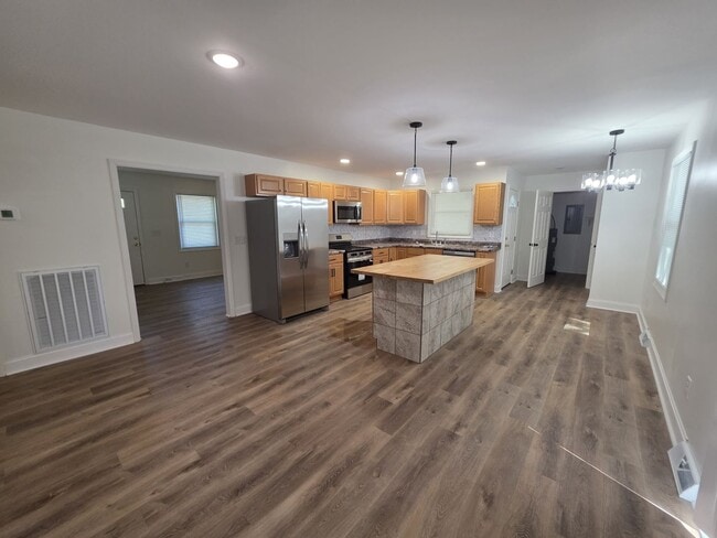 Photo - Renovated 3-Bed/2-Bath Home with Carport & Fenced Yard – Near Fort Campbell!