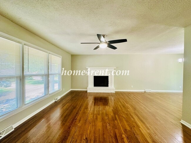Photo - Updated Raytown Ranch w/ Wood Floors, SS Appliances, Finished Basement and a Fenced Yard!