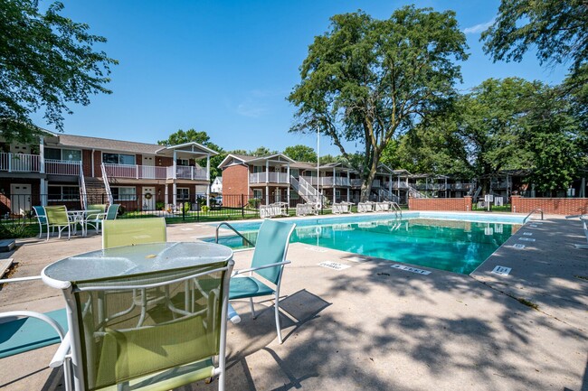 Hang out at the pool - River Ridge Place Apartments