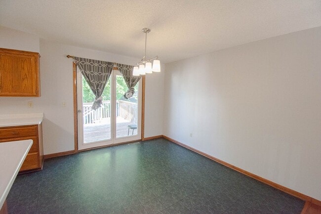Photo - NW Rochester Split-Level with Vaulted Ceilings & Detached 2-Car Garage