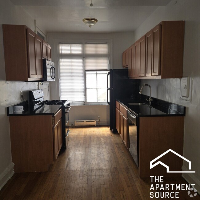 Building Photo - 948 W Cuyler Ave Unit 1E Rental