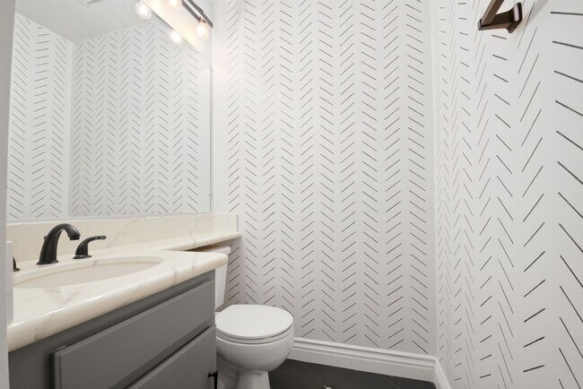 Photo - Modern 3BD 2.5BA Townhome with Vaulted Ceilings, Private Pergola Patio, and One-Car attached Garage