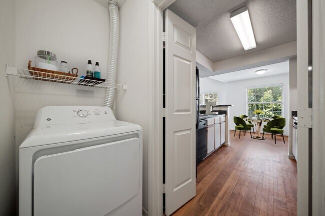 Apartments include dedicated laundry spaces for added convenience. - Stonebriar Apartment Homes