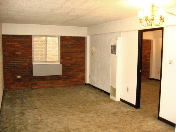 Sala de estar (junto a la Unidad) - Devon Apartments