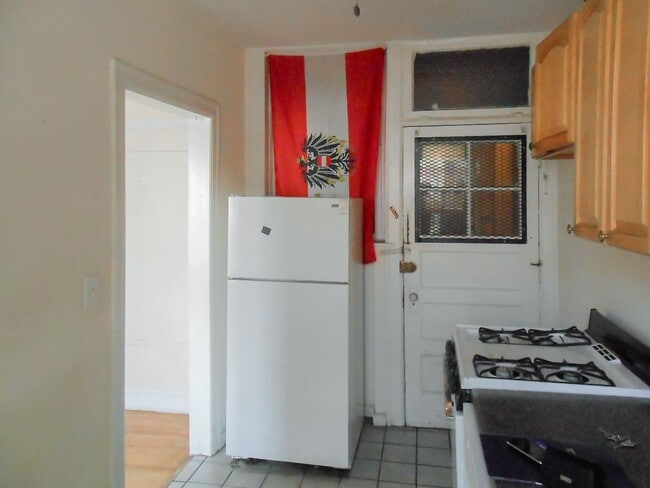 Photo - 5208-14 N. Damen / 2000-10 W. Foster