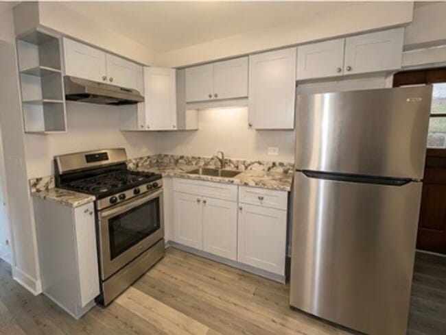 Building Photo - 5009 N River Rd Unit GW