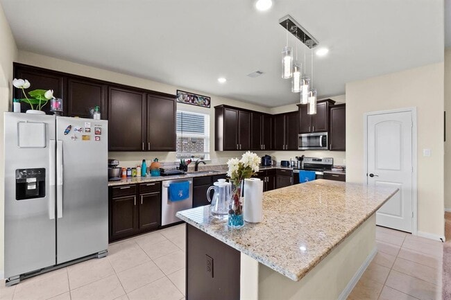 Updated kitchen for guests and family. - 22526 Red Sparrow Dr