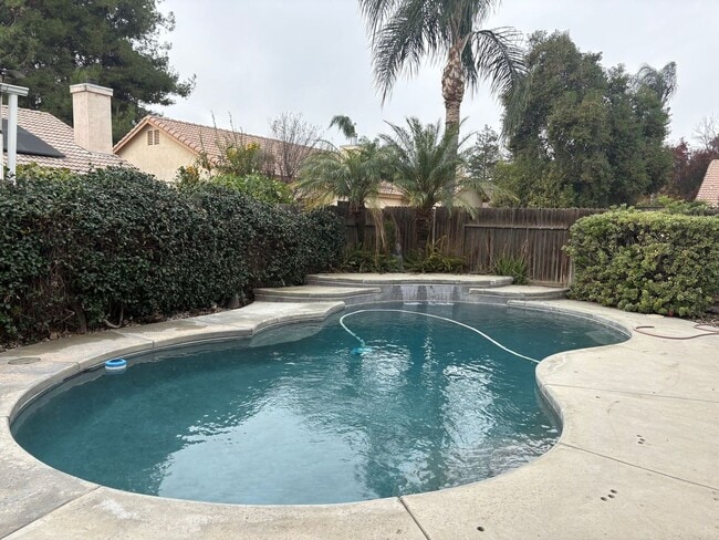 Photo - Available now! 4-Bedroom Home with Pool & Waterfall in Southwest Bakersfield