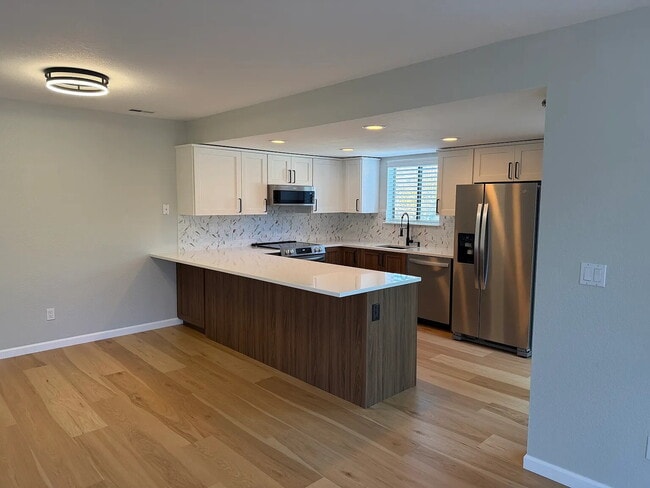 Photo - Newly Remodeled 1-Bed 1-Bath Townhome with Garage Parking – Available Now!