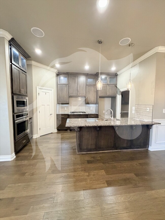 Photo - "Stunning 4-Bed Gem with Granite Touch & C...