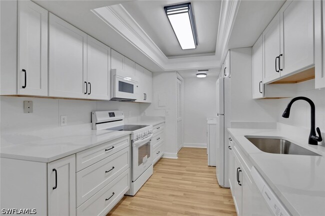 Building Photo - 3615 Boca Ciega Dr Unit 204