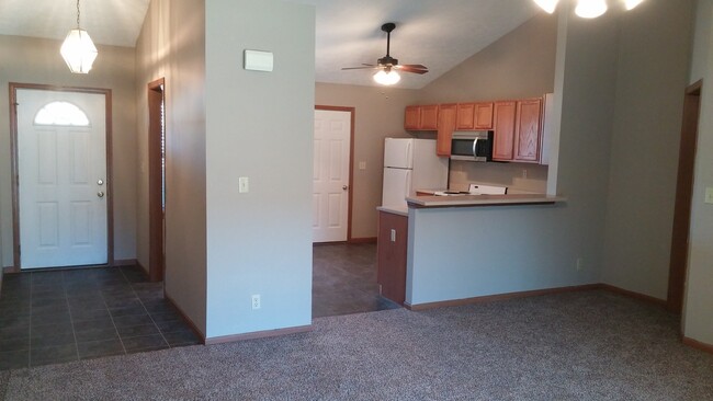 Photo - Spacious 2BD 2 BA duplex with 2 Car attached garage. Just a few steps away from everything you need!
