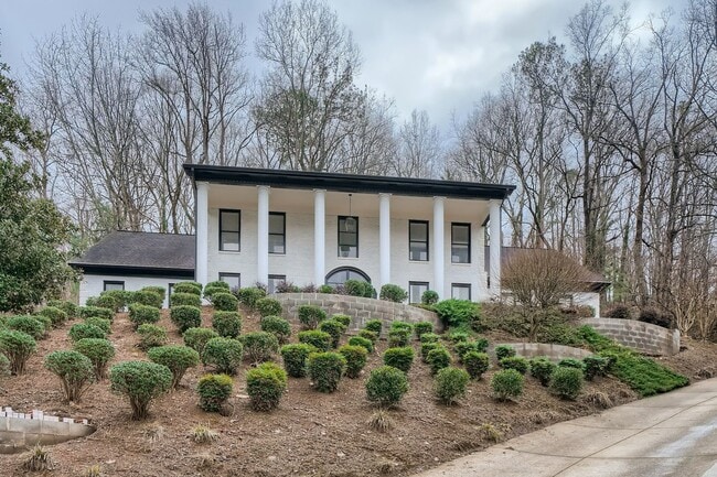 Photo - Furnished Estate Home - Double Curved Stairway - Marble Floors - Waterfall Island