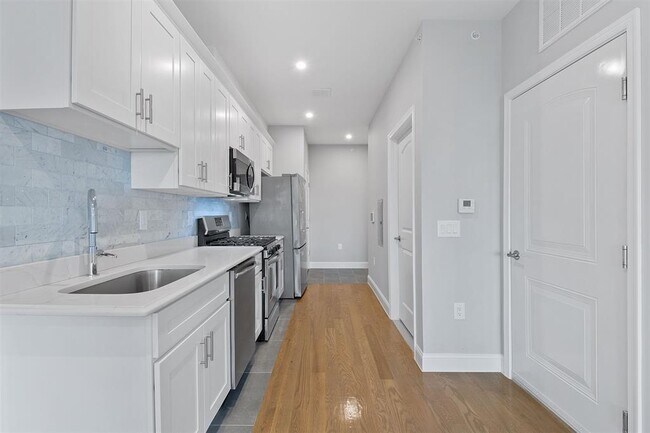 Photo - 311-315-315 West Side Ave Unit 205