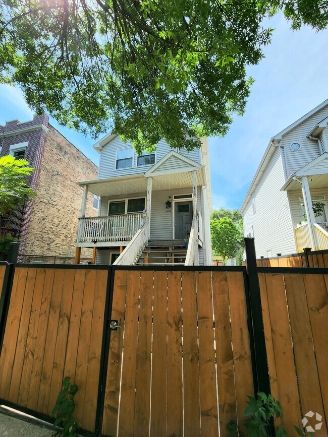 Building Photo - 2404 S Trumbull Ave Rental