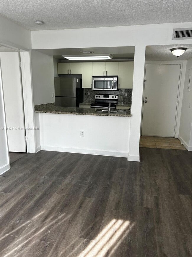 Building Photo - 6955 NW 186th St Unit F401