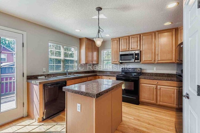 Photo - 8210 E 29th Ave