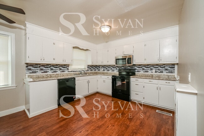 Photo - The living is easy in this 4 bedroom, 1.5 bathroom home