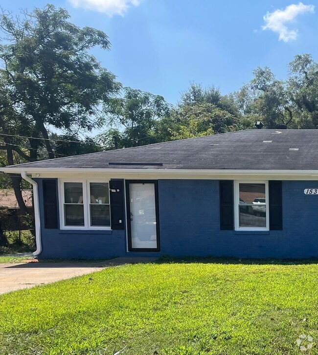 Building Photo - Renovated Duplex Rental