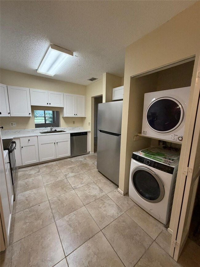 Photo - 7410 Woodmont Terrace Unit 207