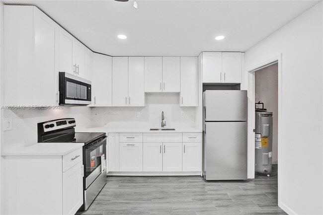 Building Photo - 5900 NW 19th St Unit A