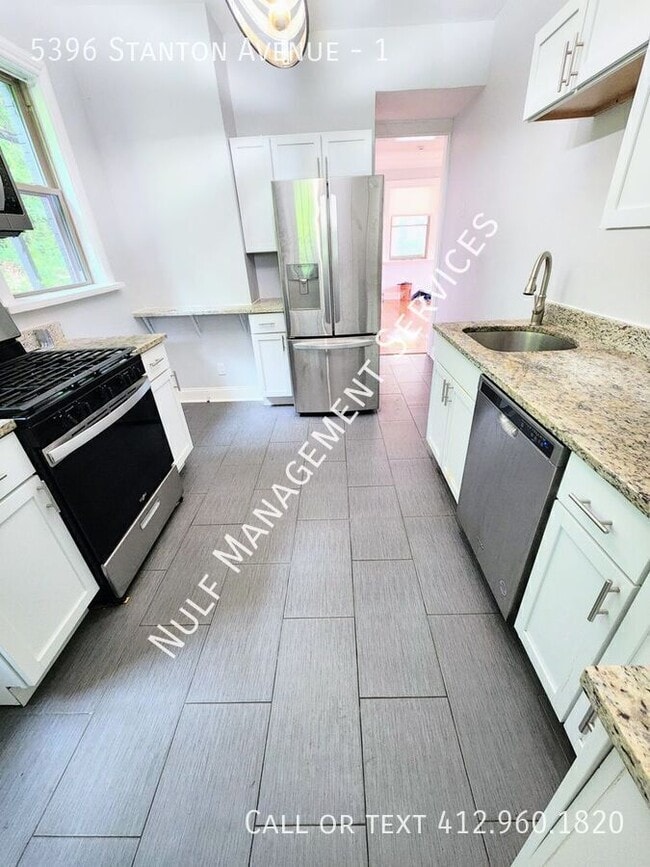 Building Photo - 5396 Stanton Ave Unit 1