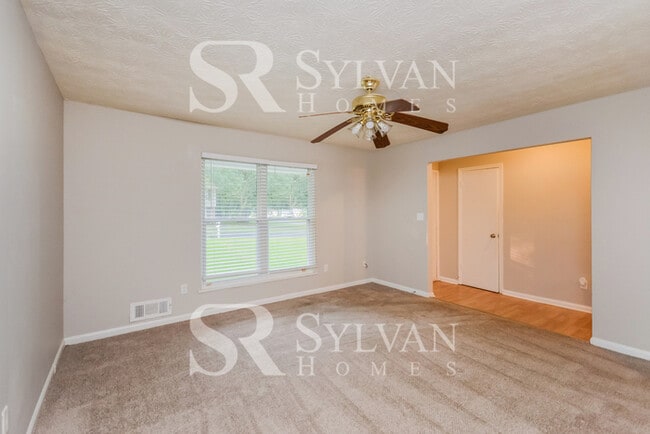 Photo - The living is easy in this 3 bedroom, 2 ba...