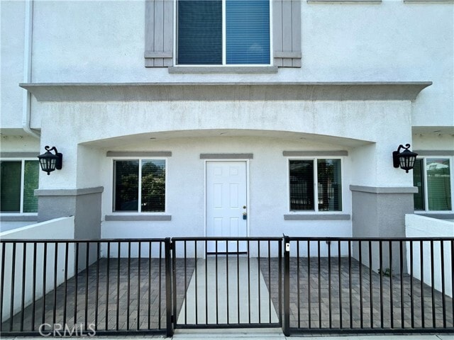 Building Photo - 13665 Arrow Unit 9