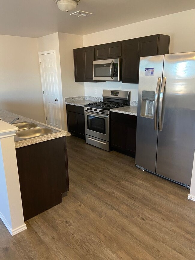 Photo - *Pre-Leasing* Three Bedroom | Two Bath Townhome in Redstone Ranch with Full Service Lawncare