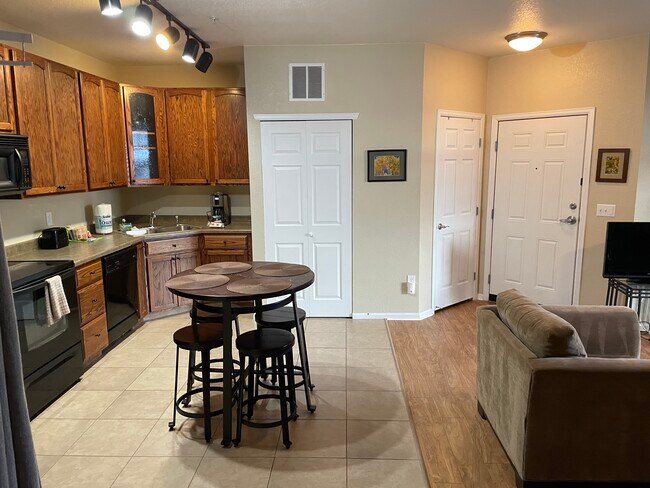 Stackable W/D behind door on the left - 3854 S Dayton Way Unit Dayton