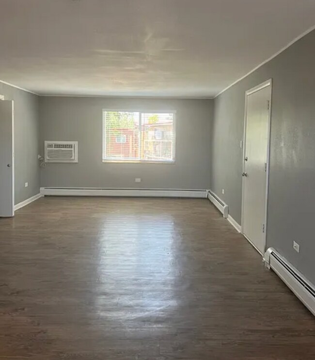 Photo - Beautifully Renovated 3 Bedroom Apartment with Private Balcony, In-Unit Laundry & A/C Unit 5