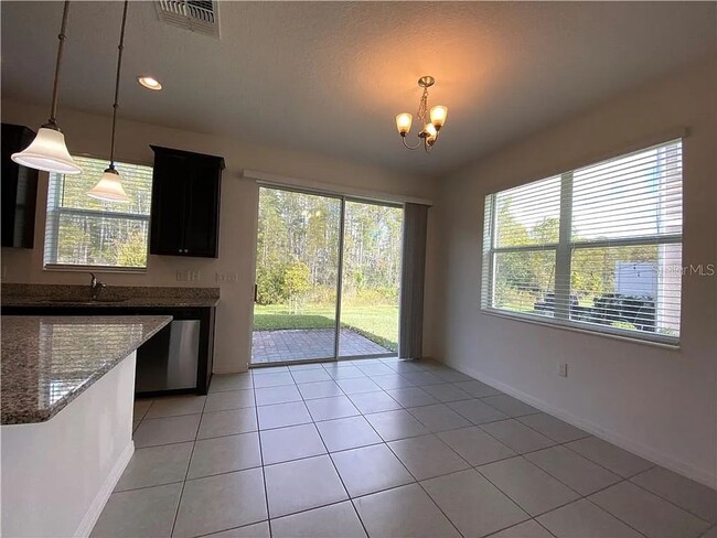 Photo - Beautiful End Unit Townhome Near Lake Nona w/ 2-Car Garage & Conservation Views!