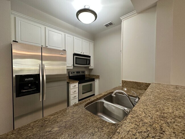 Photo - ANNUAL RENTAL - THE RESIDENCES AT COCONUT POINT- 2 BED +DEN / 2 BATH Unit 202