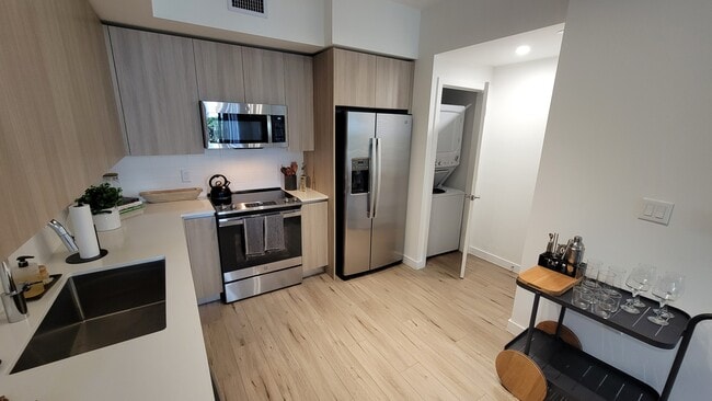 Building Photo - 7095 W 5th Ct Unit A1