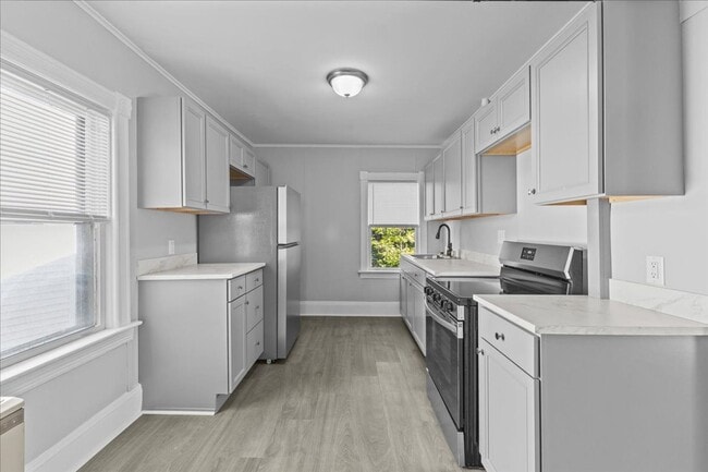 Building Photo - 410 St Paul St Unit APT 2