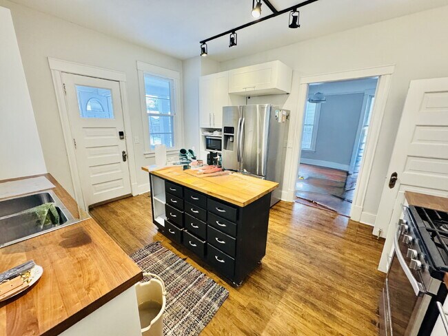 Photo - "Spacious 6-Bedroom Gem with Gleaming New Hardwood Floors in Minneapolis!"