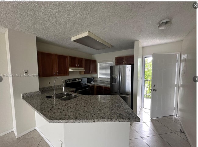 Building Photo - 8710 N Sherman Cir Rental