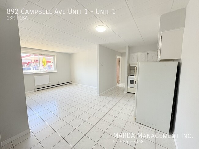 Building Photo - COZY 1 BED/1 BATH MAIN FLOOR -CLOSE TO U OF W + HYDRO! Unit 1