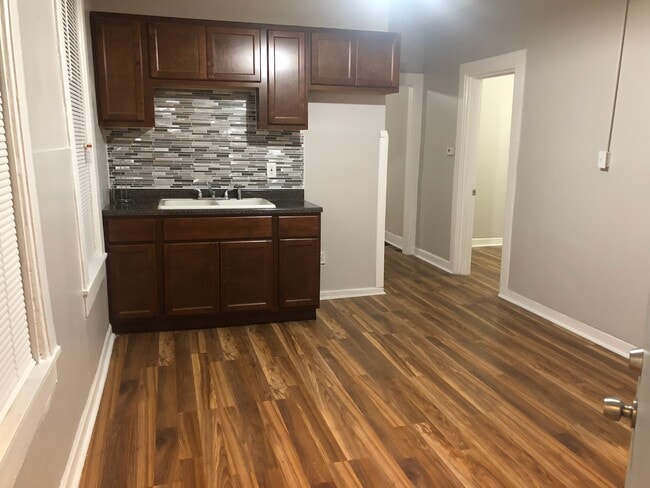 Building Photo - 9647 S Ave N Unit 2F