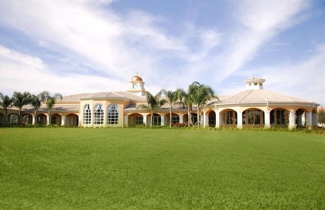 Photo - Gorgeous 3/2 Mediterranean Villa with Waterfront Screened Patio and 2-Car Garage in the Prestigio...