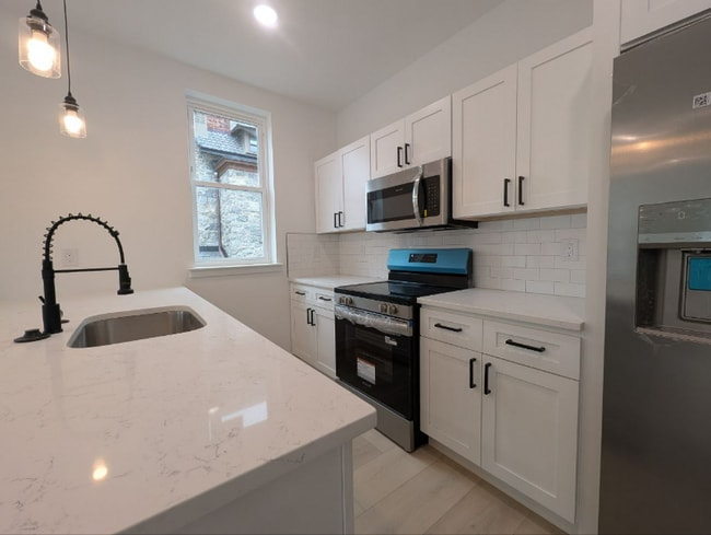 Photo - 835 N 63rd St Unidad 1