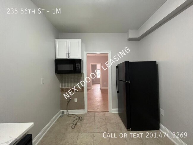 Photo - 235 56th St Unidad 1M