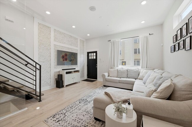 Photo - Detached Luxury 4BR/3B Retreat with Skyline Rooftop Deck, Wet Bars, Driveway & Massive Yard