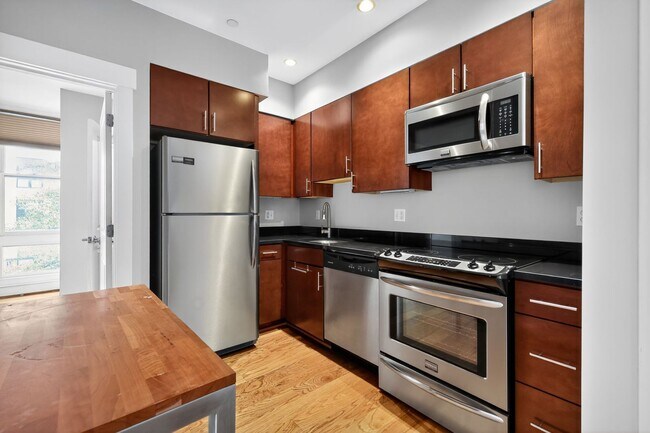Building Photo - Chic 1-Bedroom Condo in Columbia Heights –... Unit 204