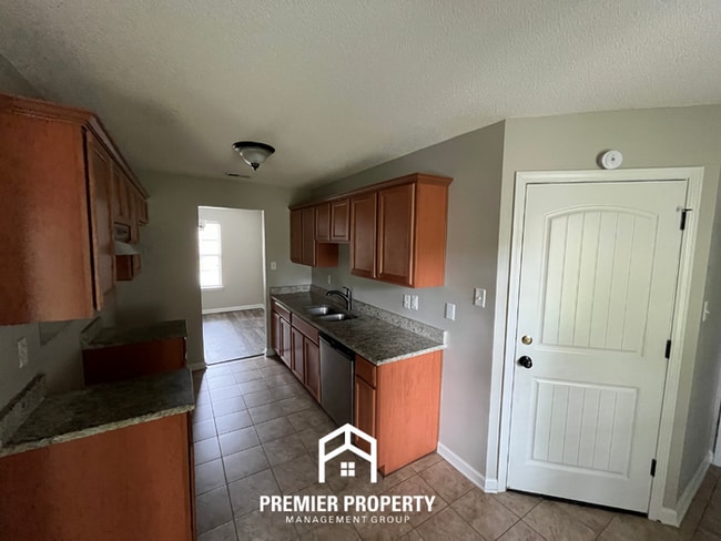 Photo - Beautiful 4BR/2BA Home | 1,605 Sq Ft, Soaring Vaulted Ceilings & 2-Car Garage